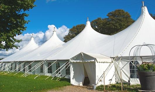 a line of sleek and modern portable restrooms ready for use at an upscale corporate event in Kaiser